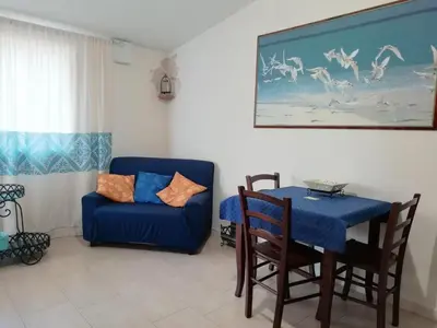 Area soggiorno di S'eredeu Apartments