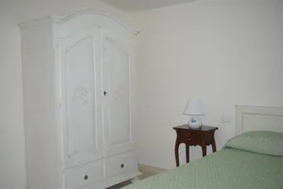 Letto o letti in una camera di S'eredeu Apartments