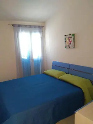 Letto o letti in una camera di casa romy
