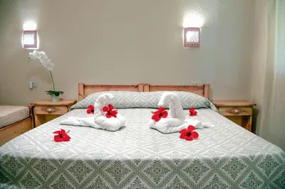Letto o letti in una camera di Hotel L'Oleandro