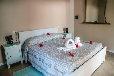 Letto o letti in una camera di Hotel L'Oleandro