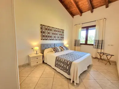 Letto o letti in una camera di Saludi&Trigu - Rural Apartments
