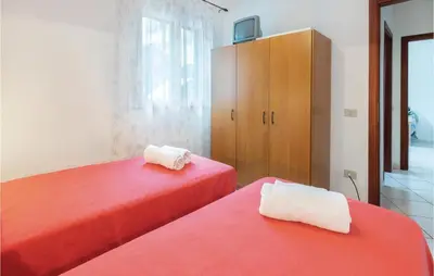 Letto o letti in una camera di Casa Sole Rosso