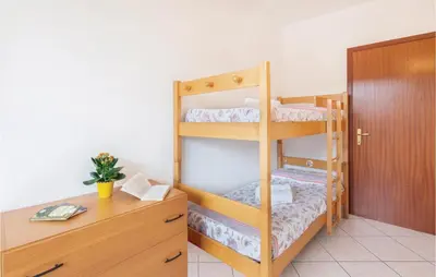 Letto o letti in una camera di Casa Sole Rosso