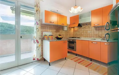 Cucina o angolo cottura di Casa Sole Rosso