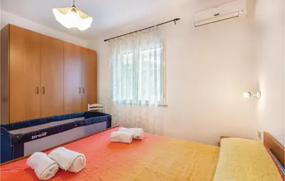 Letto o letti in una camera di Casa Sole Rosso