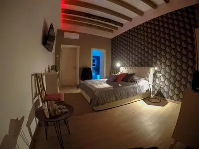 Letto o letti in una camera di MYO Cagliari Charming House