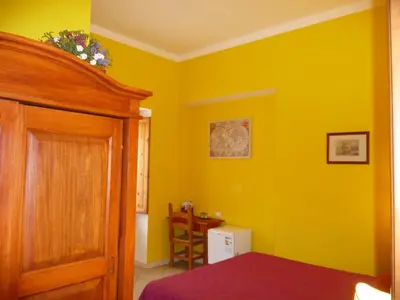 Letto o letti in una camera di Aldebaran Centro Storico