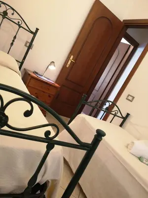 Letto o letti in una camera di Arbatax blu