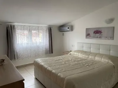 Letto o letti in una camera di Casa Alice