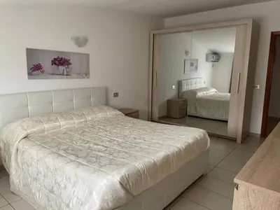 Letto o letti in una camera di Casa Alice