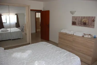 Letto o letti in una camera di Casa Alice