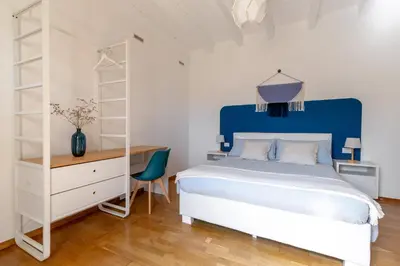 Letto o letti in una camera di Domus de Silva - Appartamento in centro storico a Cagliari
