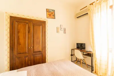 Letto o letti in una camera di Agriturismo Il Giglio
