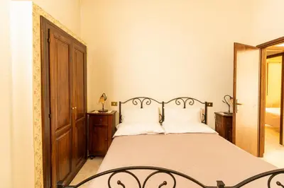 Letto o letti in una camera di Agriturismo Il Giglio