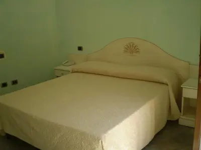 Letto o letti in una camera di Hotel Sa Cralla Villasimius