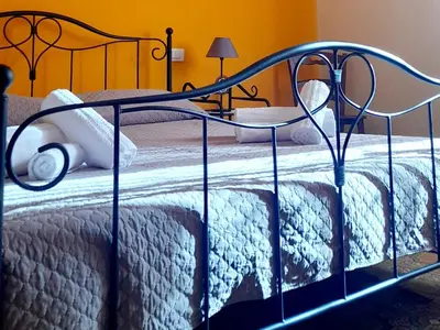 Letto o letti in una camera di Su Fassoi Cabras