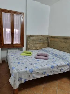 Letto o letti in una camera di Appartamenti Quilici