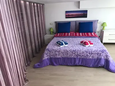 Letto o letti in una camera di Loft delizioso