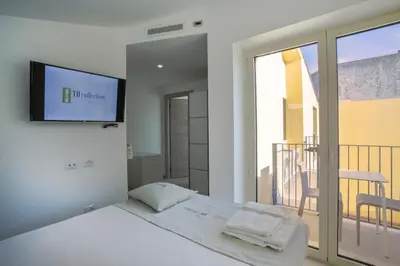 Letto o letti in una camera di TH collection rooms