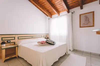 Letto o letti in una camera di Sole d'Estate Agriresidence