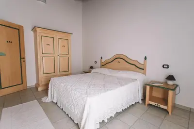 Letto o letti in una camera di Sole d'Estate Agriresidence