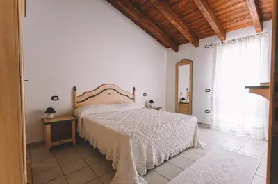 Letto o letti in una camera di Sole d'Estate Agriresidence