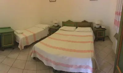 Letto o letti in una camera di Sant Efisio
