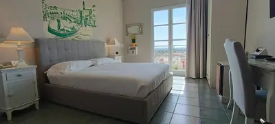 Letto o letti in una camera di Hotel Palladium