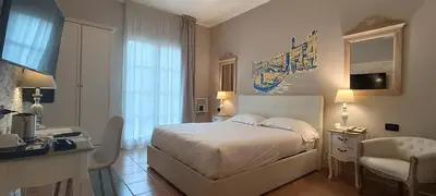 Letto o letti in una camera di Hotel Palladium