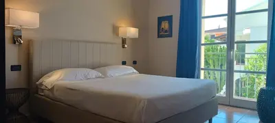 Letto o letti in una camera di Hotel Palladium
