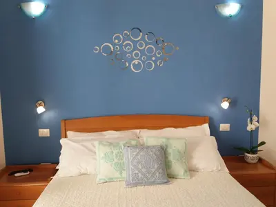 Letto o letti in una camera di B&B Briosa
