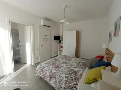 Letto o letti in una camera di AdagioStay