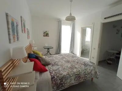 Letto o letti in una camera di AdagioStay