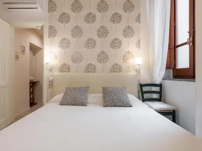 Letto o letti in una camera di Marco's stylish home In the heart of Cagliari