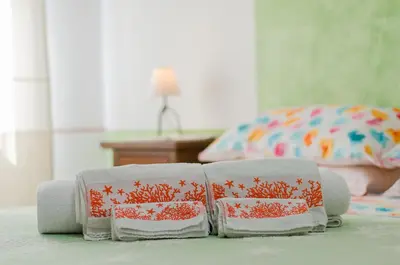 Letto o letti in una camera di Bellavista