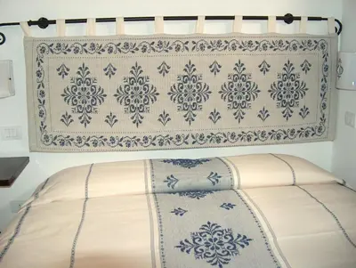Letto o letti in una camera di Guest House Il Giardino Segreto