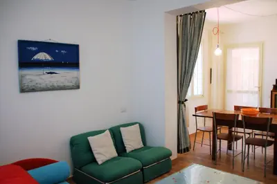 Area soggiorno di Lucia Holiday House Porto Pino
