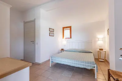 Letto o letti in una camera di Agriturismo Casa Marmida