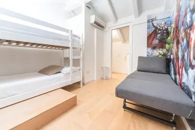 Letto o letti in una camera di A modo nostro Design Home