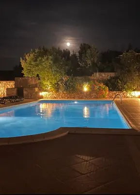 Piscina di Hotel Villaggio Ristorante Pizzeria Museo TANIT o nelle vicinanze