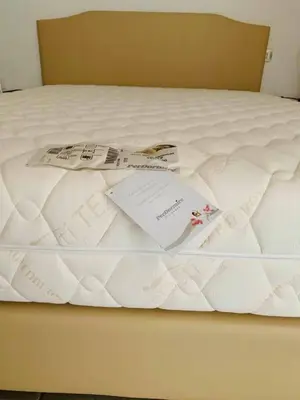Letto o letti in una camera di Hotel Villaggio Ristorante Pizzeria Museo TANIT