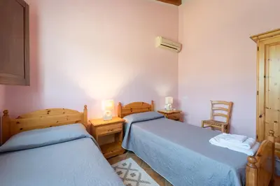 Letto o letti in una camera di Agriturismo La Grotta Del Tesoro