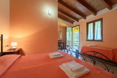 Letto o letti in una camera di Agriturismo La Grotta Del Tesoro