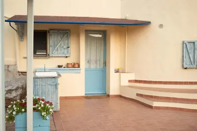Balcone o terrazza di Nel verde del Villaggio - Casetta Celeste