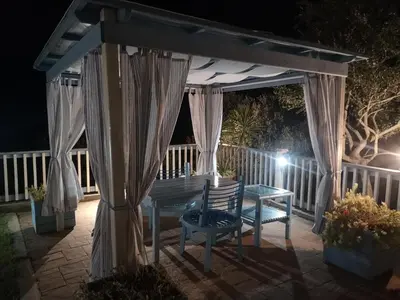 Balcone o terrazza di Nel verde del Villaggio - Casetta Celeste