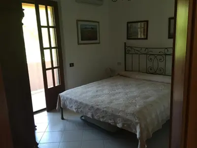 Letto o letti in una camera di Chia - Casa Margherita