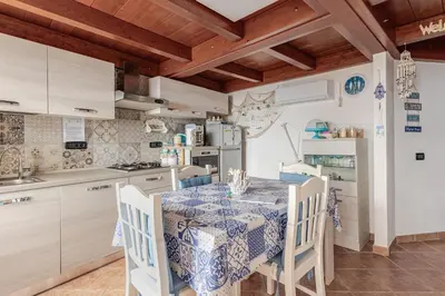 Cucina o angolo cottura di Vista Sul Pan di Zucchero - Terrazza vista mare a Nebida