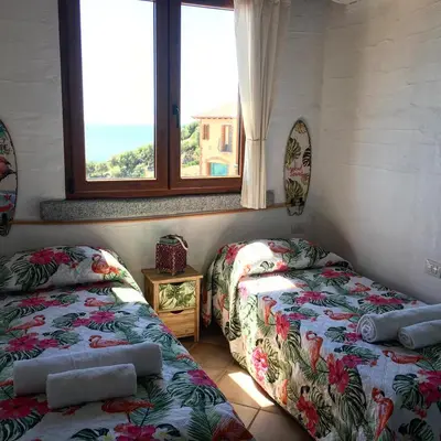 Letto o letti in una camera di Il Miraggio Tanca Piras