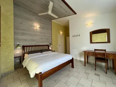 Letto o letti in una camera di Rossofiore